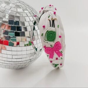 White Headband with Pink and Green Beaded Design